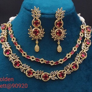 premium gold Plated Sleek Double line NECKLACE Set CZ Stone Made Ethnic Indian Bridal Combo Necklace with Earring American Diamond Set Red