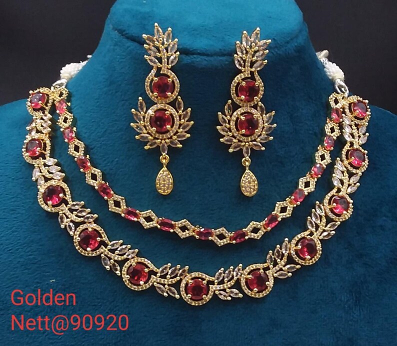premium gold Plated Sleek Double line NECKLACE Set CZ Stone Made Ethnic Indian Bridal Combo Necklace with Earring American Diamond Set Red