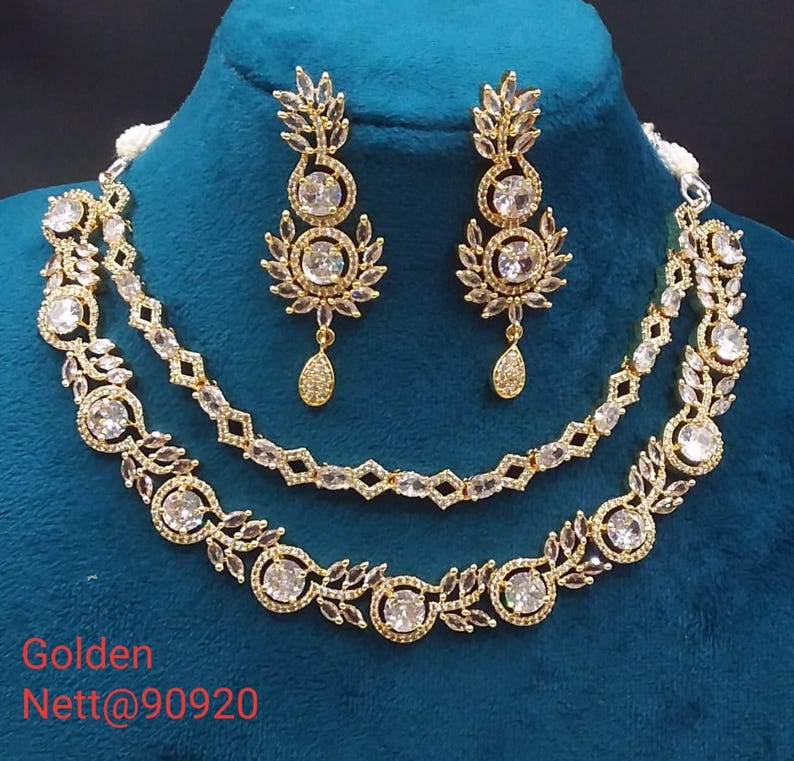 premium gold Plated Sleek Double line NECKLACE Set CZ Stone Made Ethnic Indian Bridal Combo Necklace with Earring American Diamond Set Gold
