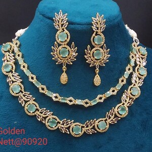 premium gold Plated Sleek Double line NECKLACE Set CZ Stone Made Ethnic Indian Bridal Combo Necklace with Earring American Diamond Set mint