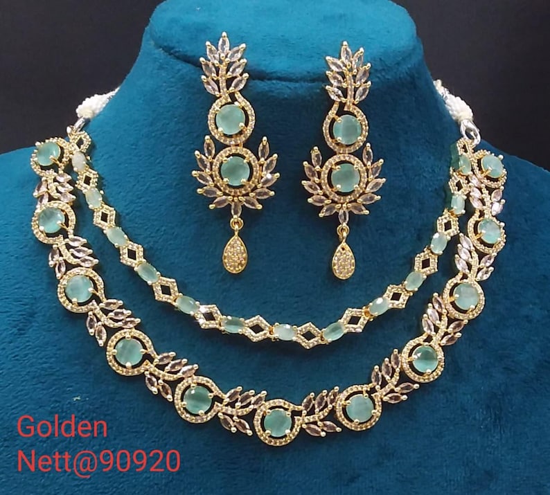 premium gold Plated Sleek Double line NECKLACE Set CZ Stone Made Ethnic Indian Bridal Combo Necklace with Earring American Diamond Set mint