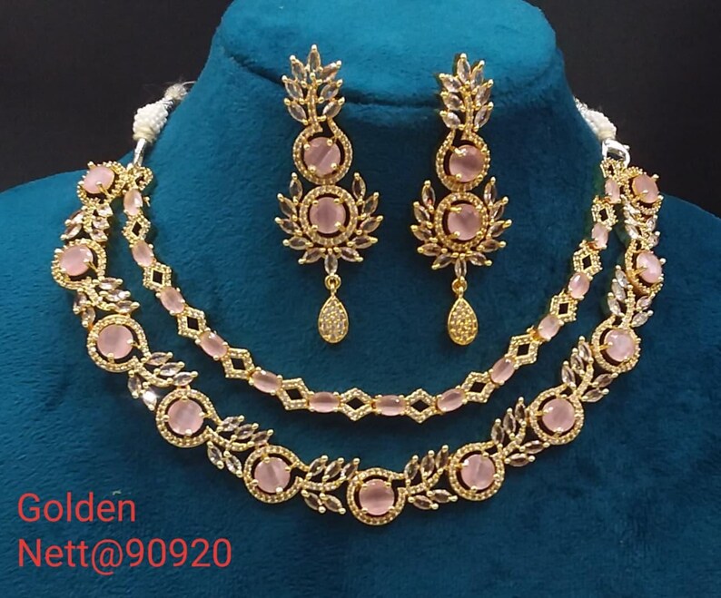 premium gold Plated Sleek Double line NECKLACE Set CZ Stone Made Ethnic Indian Bridal Combo Necklace with Earring American Diamond Set Pink