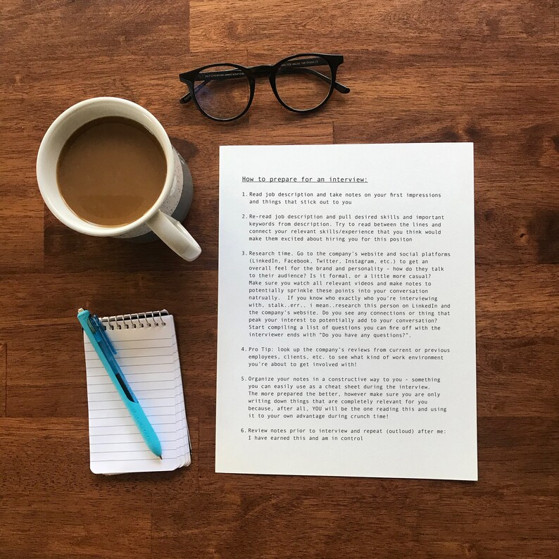 May include: A close-up of a handwritten document with the title "How to prepare for an interview." The document lists six steps for preparing for an interview, including researching the company, reviewing the job description, and practicing answers to common interview questions.
