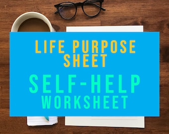 May include: A blue and yellow self-help worksheet titled "Life Purpose Sheet". The worksheet is on a wooden table with a cup of coffee, a pen, and a pair of glasses.