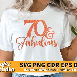 Puede incluir: Camiseta blanca con el texto "70 & Fabulous" en letras de purpurina naranja. La camiseta también tiene el texto "Grafix Studio" y "SVG PNG CDR EPS DXF INSTANT DOWNLOAD | DIGITAL FILES" en una pancarta amarilla.