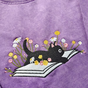 Cute Lying On The Book Cat Embroidered Tshirt,Unisex Oversize Black Cat shirt,Wildflower tshirt,Book tshirt,Cat Lover Gift,Book lover gift image 4