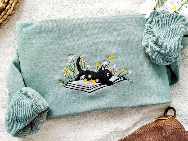 Cute Lying On The Book Cat Embroidered Sweatshirt,Embroidered Daisy crewneck,Reading Sweatshirt,Books Reading, Gift for Cat Lover image 1