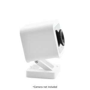 May include: White security camera mount with a swivel base and a black lens. *Camera not included*