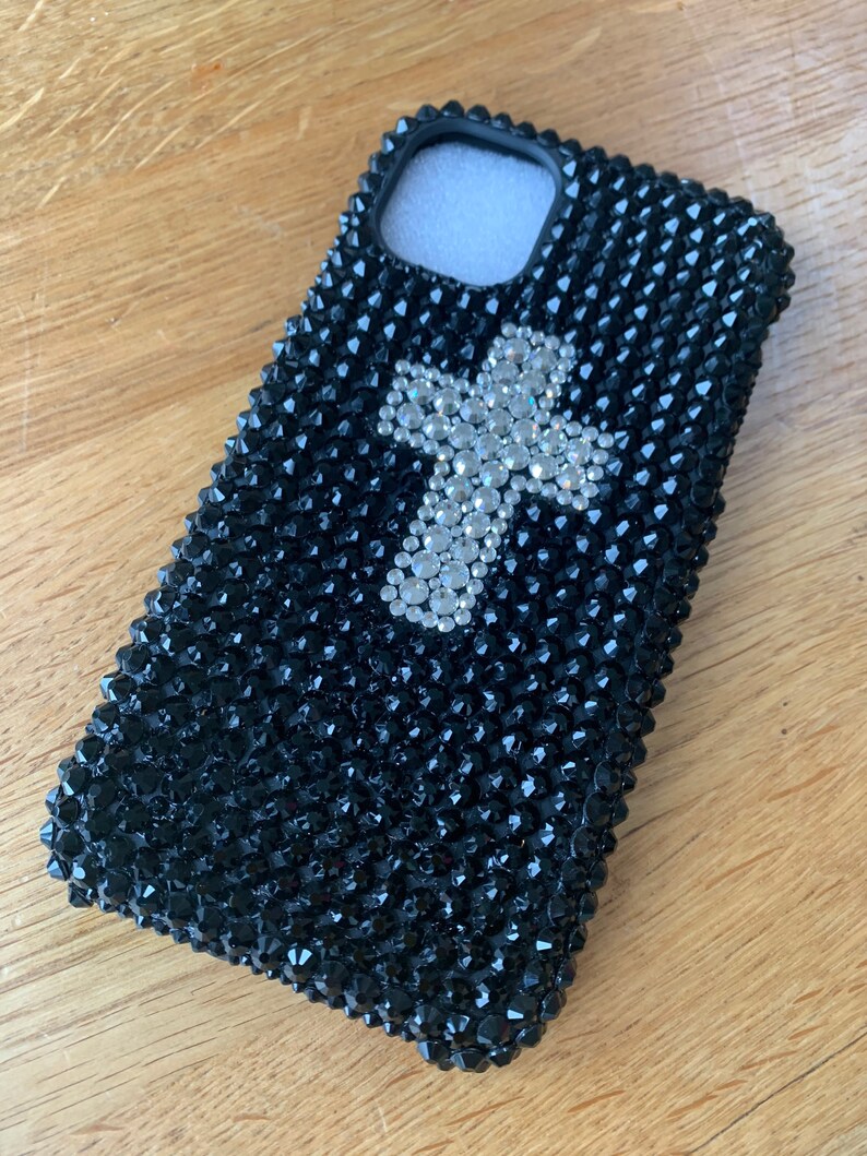 Hand applied. Stunning bling diamant\u00e9 crystal cross design in black and silver for iPhone 11 on soft flexible biodegradable phone case