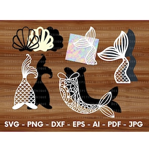 May include: A set of six white mermaid tail and seashell SVG cut files. The designs feature intricate details and are perfect for crafting projects.