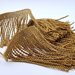 Fin metallisk bullionfrans - guld - metervara - 5503