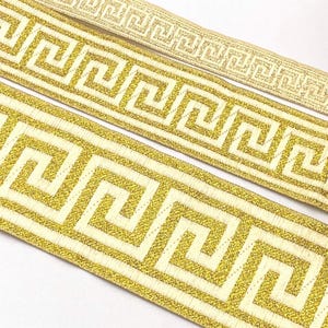 Treccia metallica con motivo a chiave greca, oro 9863
