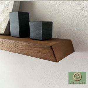 Floating wall shelf made of oak with bevelled cut - stylish solid wood shelf for books, plants or decorations. Various colours and lengths.