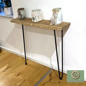 Oak console table with live edge and hairpin legs – Natural design, robust, and modern. Perfect for the hallway, living room, or office.