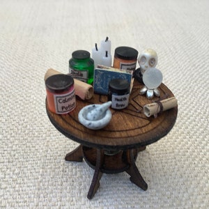 Miniature 24th scale witch kit AND table, Crystal ball, candles, pestle and mortar, skull, scrolls and spell book