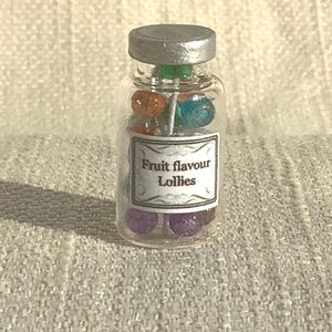 Dollhouse lollipops, miniature sweet shop, tiny jars of sweets.