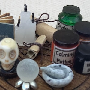 Miniature 24th scale witch kit, Crystal ball, candles, pestle and mortar, skull, scrolls and spell book