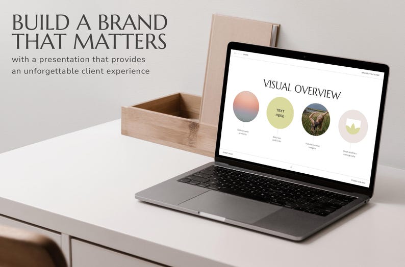 May include: A laptop computer displaying a presentation slide with the title "Visual Overview". The slide has four sections with different visual elements, including a gradient circle, a circle with the text "Text Here", a photo of a field, and a circle with a flower design.