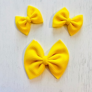 Bright Yellow Bow: Nylon headband, Headwrap, Piggies or Clip Bow