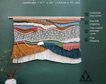 May include: A colorful macrame wall hanging with a wavy design in shades of orange, blue, green, and white. The wall hanging is 30 inches by 24 inches, 40 inches by 32 inches, or 47 inches by 36 inches.