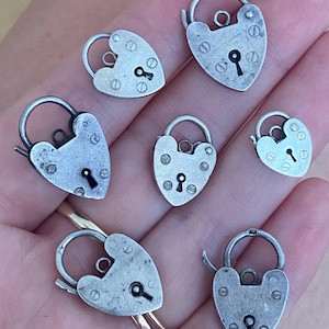 On hold for Karen Collection of 7 vintage silver padlock heart charms/clasps
