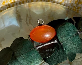 Antique carnelian button charm.