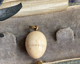 Antique bone egg charm keepsake