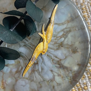 Antique enamel bird brooch in silver