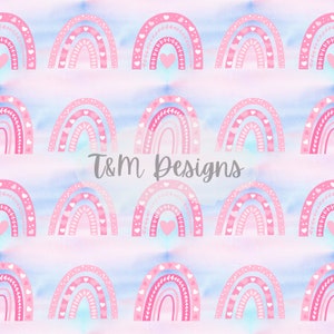 May include: A repeating pattern of pink and light blue rainbows with heart and leaf details. The watercolor background is light blue and pink. The text "T&M Designs" is in the centre.