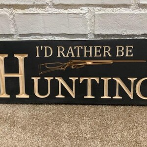 carved signs; hunting signs; golfing signs; fishing signs