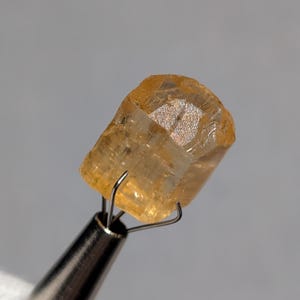 Imperial topaz thumbnail mineral specimen from Ouro Preto, Minas Gerais, Brazil - 12.7 carats