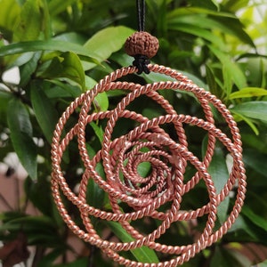 Double vortex pendant, lost+sacred cubits