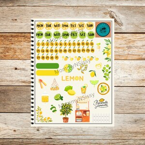 May include: A printable planner page with a lemon theme. The page includes a calendar, a lemon slice, a pitcher of lemonade, a lemon tree, and a lemonade stand. The text "LEMON" is printed in large letters at the bottom of the page.