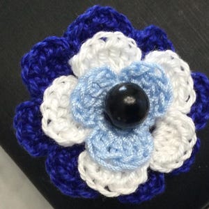 Handmade crochet evil eye protection flower brooch