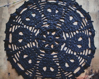 Handmade crochet skull altar cloth, ornate gothic pattern featuring skulls; perfect for creepy bedrooms and witchy spaces.