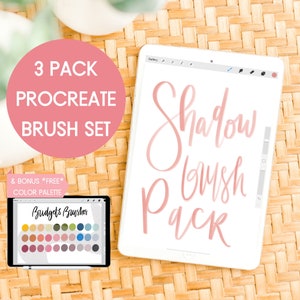 May include: A digital tablet displaying a pink and white design with the text "Shadow Brush Pack". The tablet is on a woven surface with a green plant in the background. A smaller tablet shows a color palette with the text "Budgets Brushes". The text "3 Pack Procreate Brush Set & Bonus *Free* Color Palette" is displayed on a pink circle.