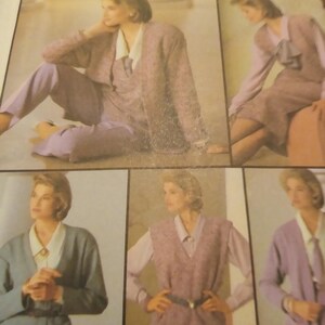 May include: A vintage sewing pattern featuring women's fashion. The image showcases various outfits, including a blazer, pants, and a sweater vest, in shades of lavender, blue, and gray. The pattern is from Simplicity.