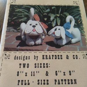 Uncut Scraps the dog & Snippers the pup designed by Krafdee