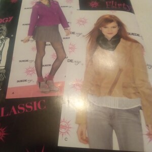 May include: A sewing pattern featuring images of women's jackets and skirts. The pattern includes the text "SUEDE saus", "Flirty", and "LASSIC". The pattern also includes the size "DS" and the numbers "056" and "8".