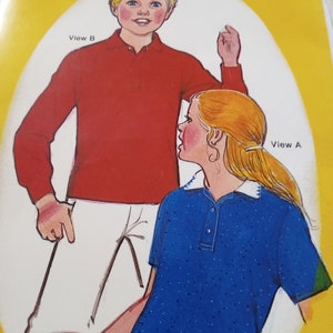 May include: Sew Easy pattern number 150 for a child's polo shirt. The pattern includes two views, one with long sleeves and one with short sleeves. The pattern is for sizes 6, 8, 10, and 12.