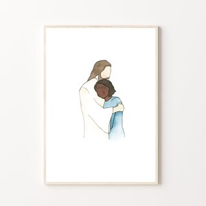 May include: Watercolor art print depicting a figure in white robes embracing another figure in a blue garment. The figures are set against a white background, framed in a light wood frame. The artwork has a minimalist style.