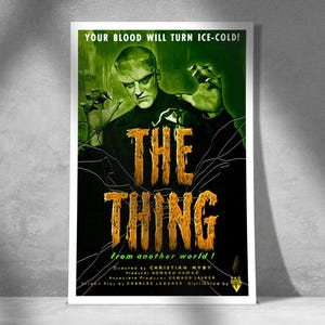 May include: A vintage movie poster for the 1951 science fiction horror film "The Thing from Another World". The poster features a green and black background with a large, yellow, dripping text title. A man with a green face and a black suit is shown with his hands raised, as if he is about to attack.