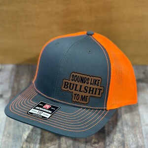 Sounds Like Bullshit To Me Trucker Hat - Flat Bill, High Crown, Adjustable Snapback, Funny Saying Cap
