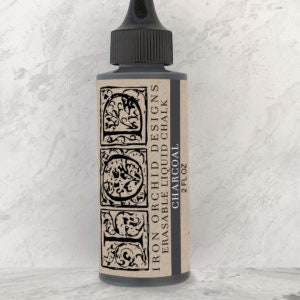 May include: A 2 fl oz bottle of Iron Orchid Designs erasable liquid chalk in the color Charcoal.