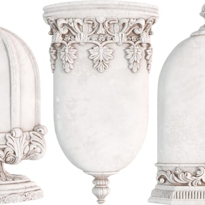 May include: Three white, ornate, decorative, plaster, wall-mounted,  vases with a distressed finish. The vases are in different shapes and sizes.