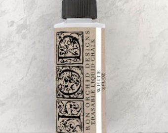 May include: A 2 fl oz bottle of white Iron Orchid Designs Erasable Liquid Chalk. The bottle has a black cap and a label with the company logo and product name.