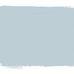 Puede incluir: Una muestra de pintura azul claro con un borde rugoso y texturizado.
