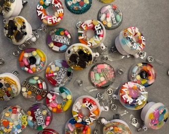 The Mystery Bin - Random Pill Badge Reel (Single)