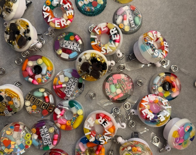 The Mystery Bin - Random Pill Badge Reel (Single)
