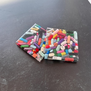 Kleineres quadratisches Pillenuntersetzer-Set